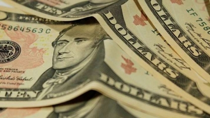 Dólar tem 3ª queda seguida e termina abaixo de R$ 4,10  