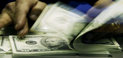 Dólar sobe ante real com correção e à espera de pesquisa eleitoral 