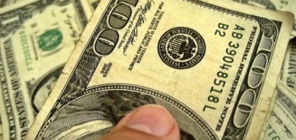 Dólar recua com força ante real acompanhando exterior após cautela do Fed