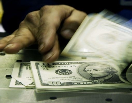 Dólar fecha na mínima desde fevereiro e reduz queda de olho em Previdência 