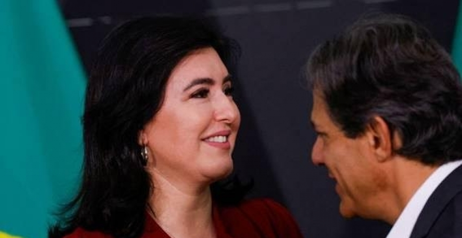 Os ministros Simone Tebet (Planejamento) e Fernando Haddad (Fazenda) durante evento em Brasília. Foto: Adriano Machado/Reuters 